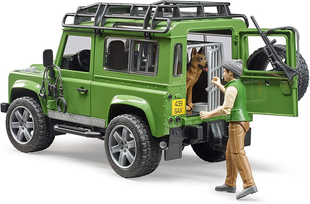 Land Rover w/Forester and Dog